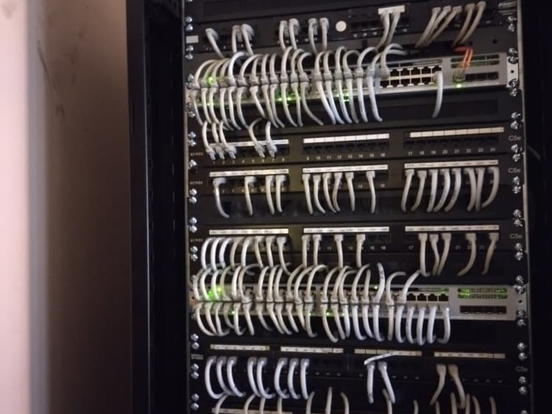 Completed structured cabling in an open server rack